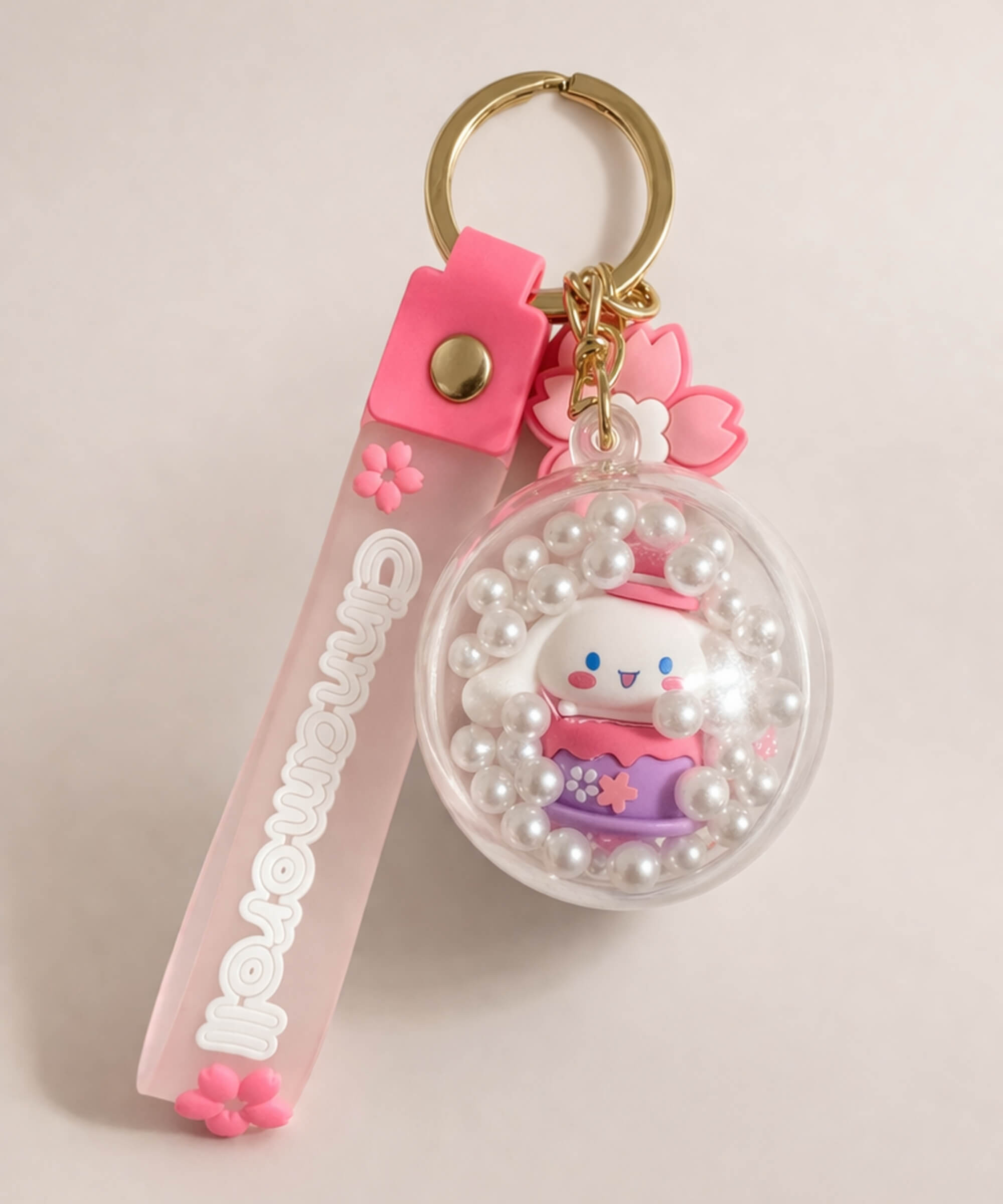 Cinnamoroll teacup shaker keychain with floating beads inside clear charm